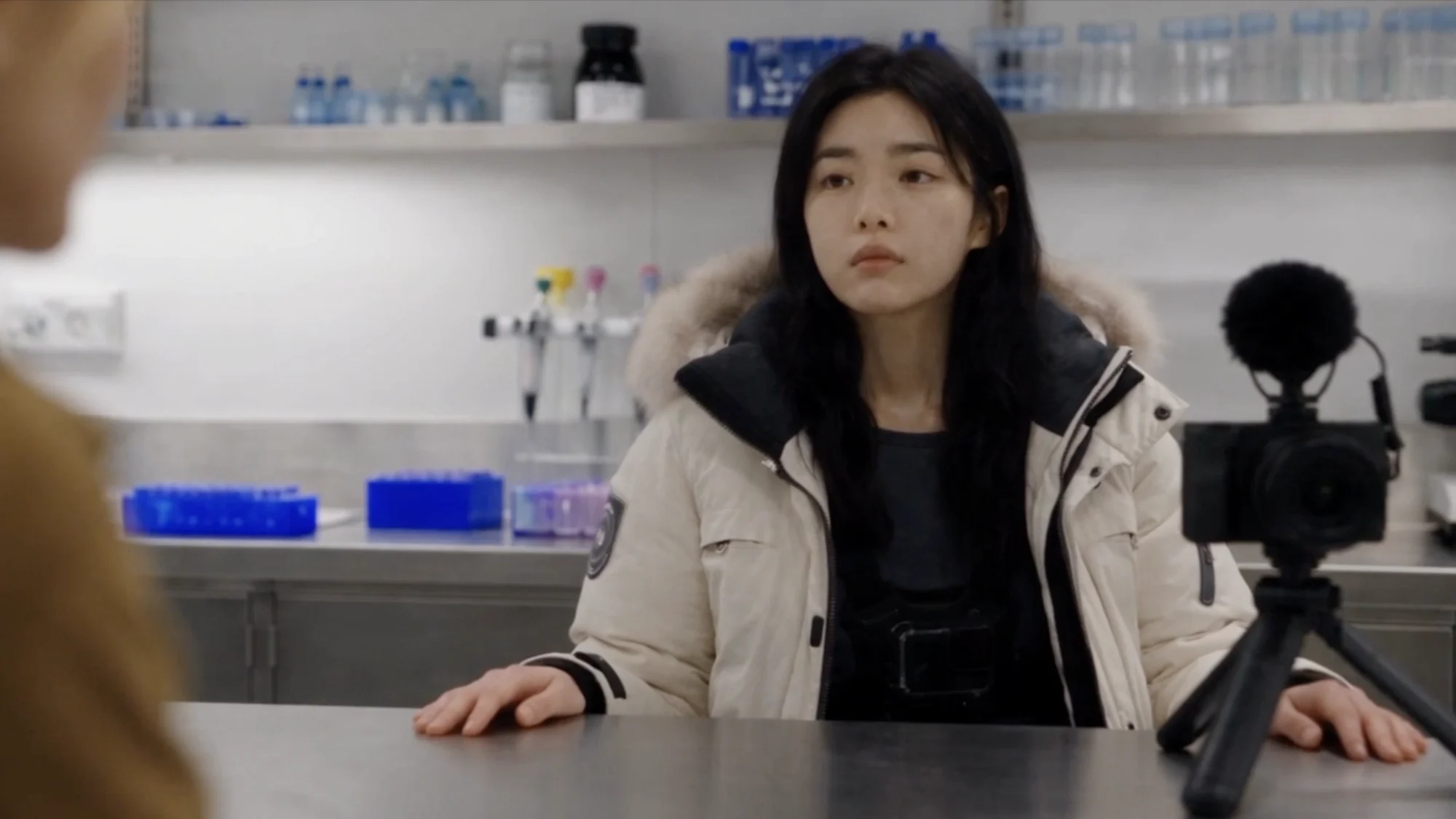 Mar alone at a laboratory bench in a remote research facility